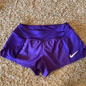 Purple Nike shorts